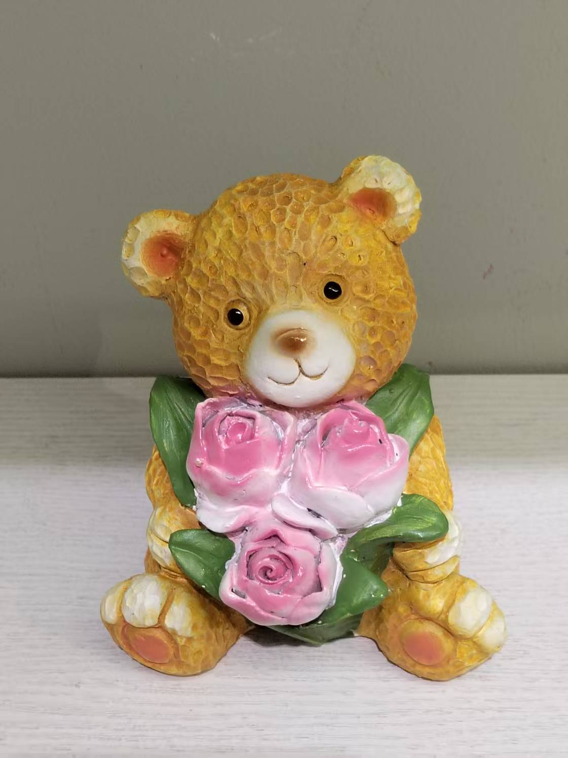 Bear Holding Bouquet